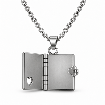 Open mini book pendant showing two blank stainless steel inside pages